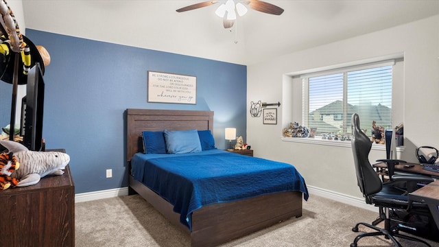 bedroom featuring ceiling fan and light colored carpet