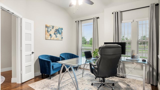 office featuring ceiling fan, lofted ceiling, and hardwood / wood-style flooring