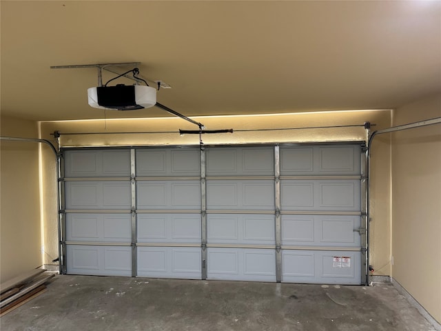 garage featuring a garage door opener