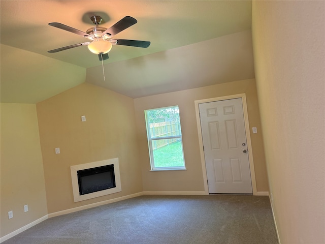 unfurnished living room with carpet, ceiling fan, and lofted ceiling