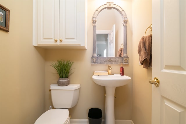 bathroom featuring toilet