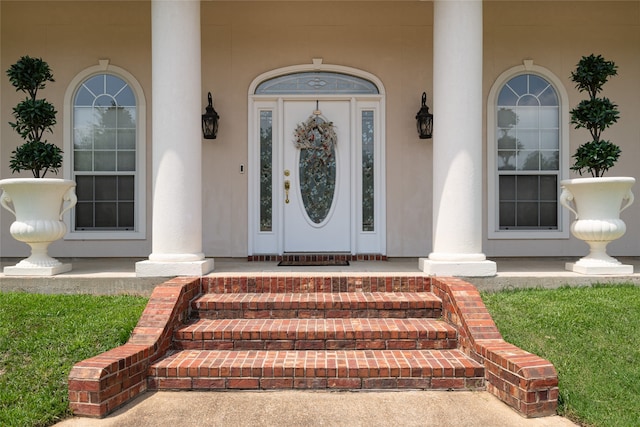 property entrance featuring covered porch