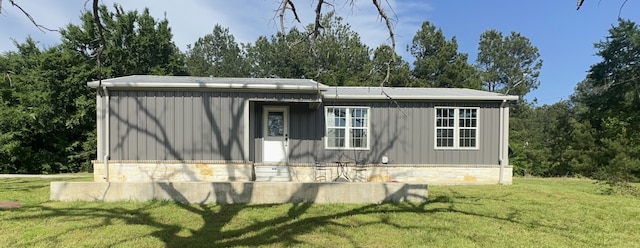 exterior space with a lawn