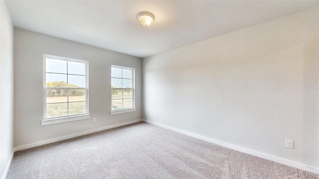 empty room with carpet floors