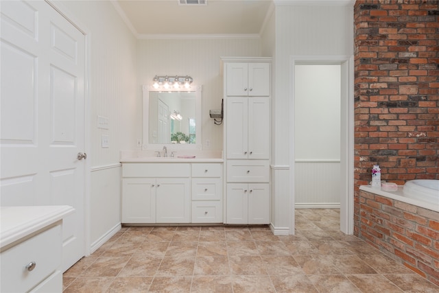 bathroom featuring tile floors, a bath to relax in, crown molding, and vanity