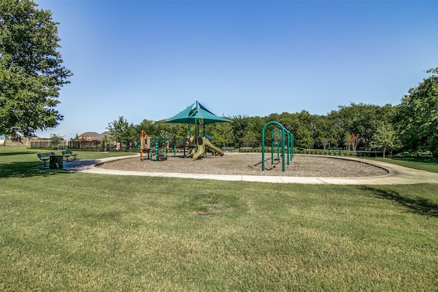 view of playground featuring a lawn