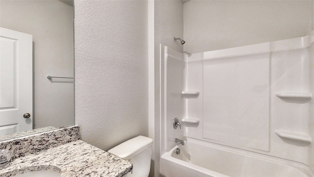 full bathroom with vanity, shower / washtub combination, and toilet