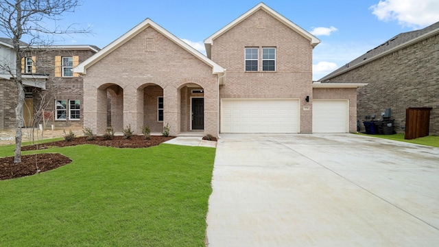 view of front of house featuring a garage and a front lawn