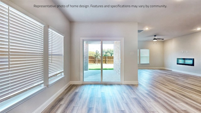 interior space featuring ceiling fan and light hardwood / wood-style flooring