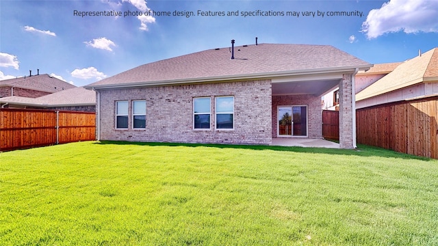 back of house with a patio area and a lawn