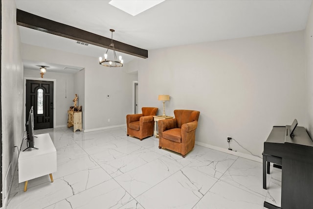 sitting room featuring beamed ceiling, an inviting chandelier, and light tile floors