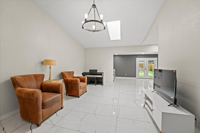 living room featuring french doors, a skylight, light tile floors, and an inviting chandelier