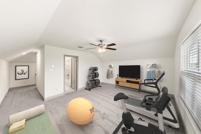 exercise room featuring carpet flooring, ceiling fan, and lofted ceiling