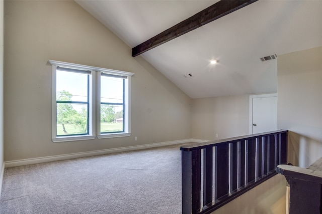 bonus room with carpet and lofted ceiling with beams