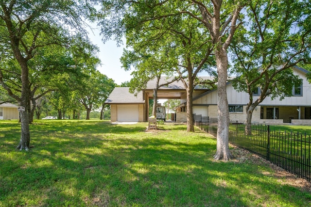 view of yard featuring a garage