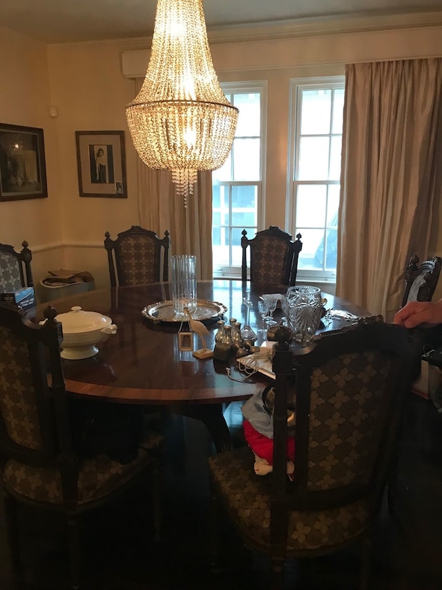 dining area with a notable chandelier