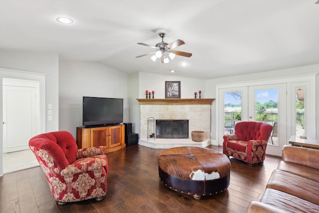 living room with french doors, ceiling fan, vaulted ceiling, and dark hardwood / wood-style flooring