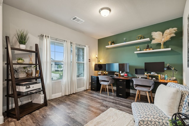 office area featuring wood-type flooring and a textured ceiling