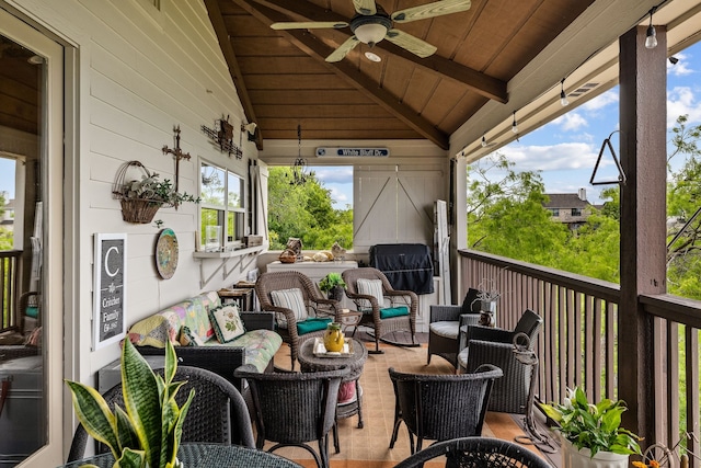 exterior space with an outdoor hangout area and ceiling fan