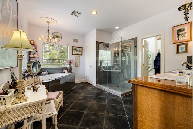 bathroom with tile floors, a notable chandelier, separate shower and tub, and vanity