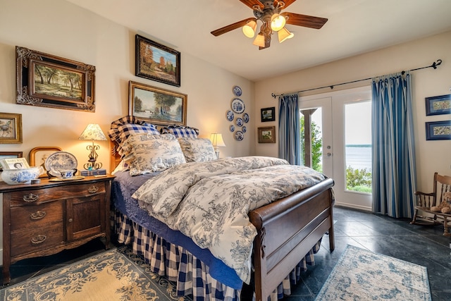 tiled bedroom with ceiling fan, french doors, and access to outside