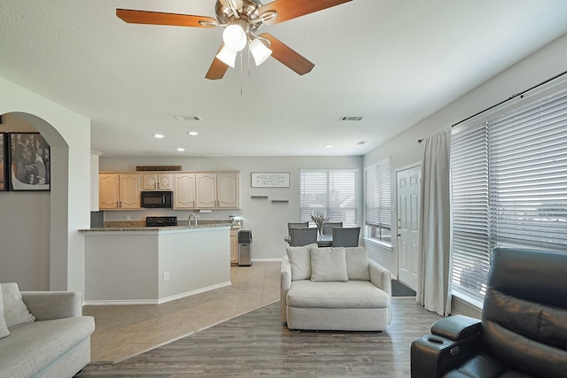 living room featuring light tile patterned floors