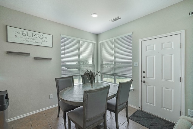 view of tiled dining space