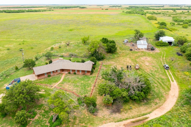 birds eye view of property featuring a rural view