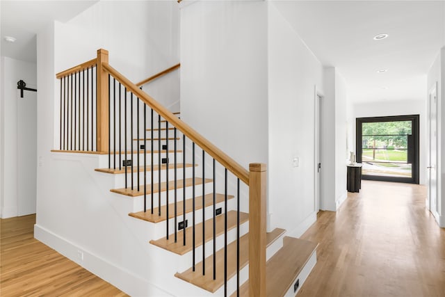 stairway with wood-type flooring