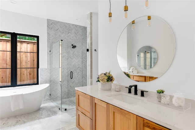 bathroom featuring vanity and plus walk in shower