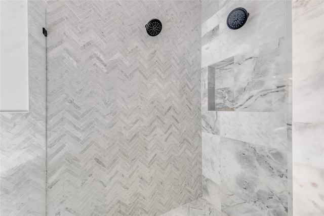 details featuring tiled shower