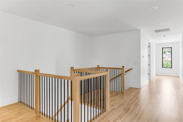 corridor featuring light hardwood / wood-style flooring