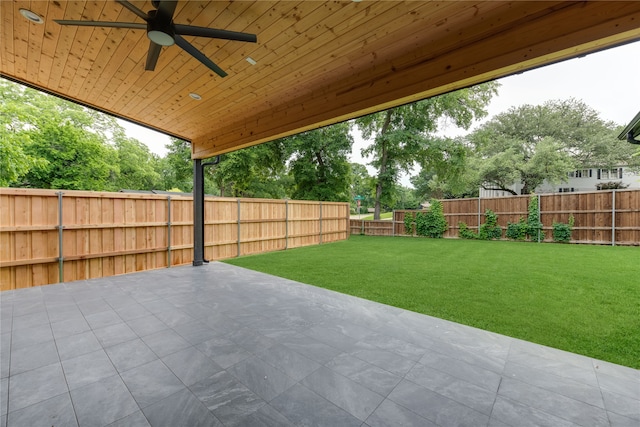 view of patio featuring ceiling fan