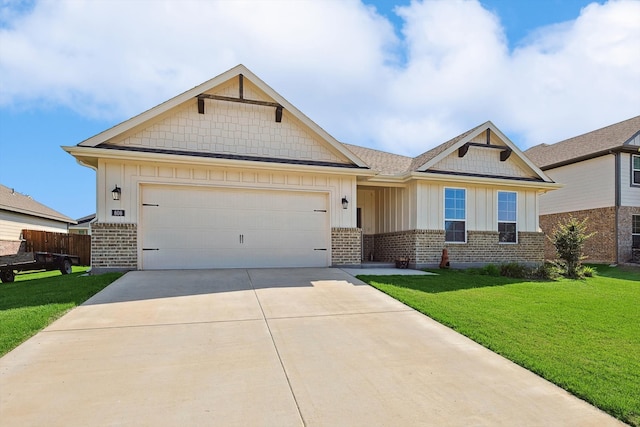 craftsman-style house with a garage and a front lawn