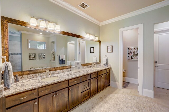 bedroom with ensuite bathroom, crown molding, a tray ceiling, ceiling fan, and hardwood / wood-style floors