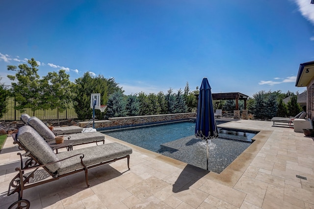 view of swimming pool with a gazebo and a patio area