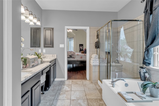 bathroom featuring tile flooring, dual bowl vanity, a healthy amount of sunlight, separate shower and tub, and ceiling fan