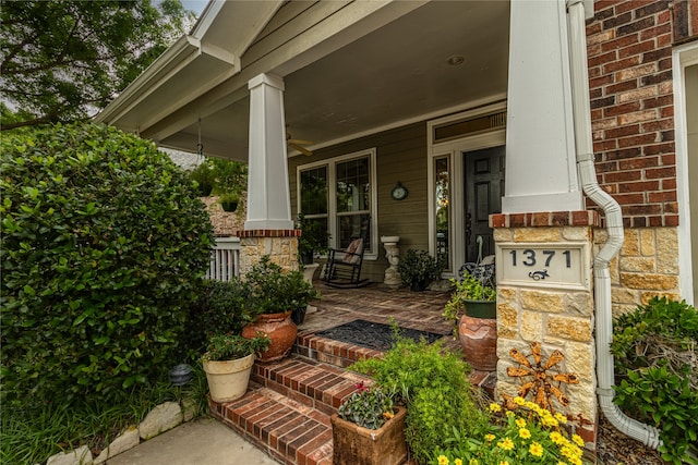 property entrance with covered porch