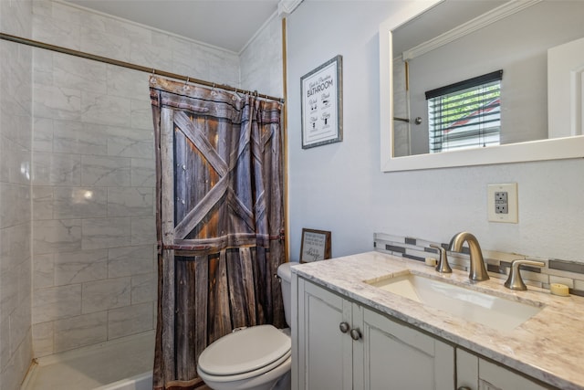 bathroom featuring walk in shower, vanity, crown molding, and toilet