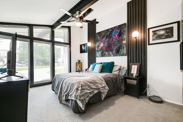 bedroom featuring light carpet, access to exterior, floor to ceiling windows, and ceiling fan