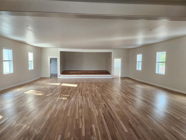 unfurnished living room with light wood-type flooring