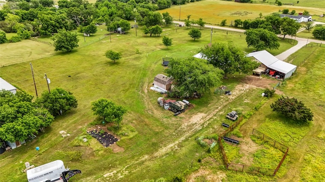 birds eye view of property featuring a rural view