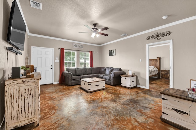 living room featuring ceiling fan, a textured ceiling, and ornamental molding