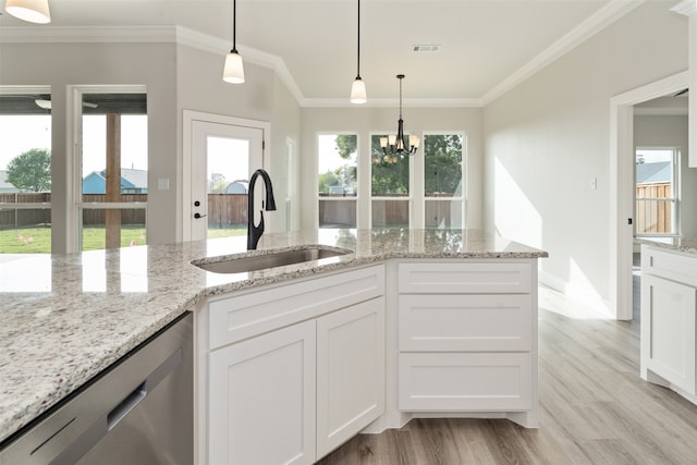 kitchen featuring stainless steel dishwasher, white cabinetry, pendant lighting, and light wood-type flooring