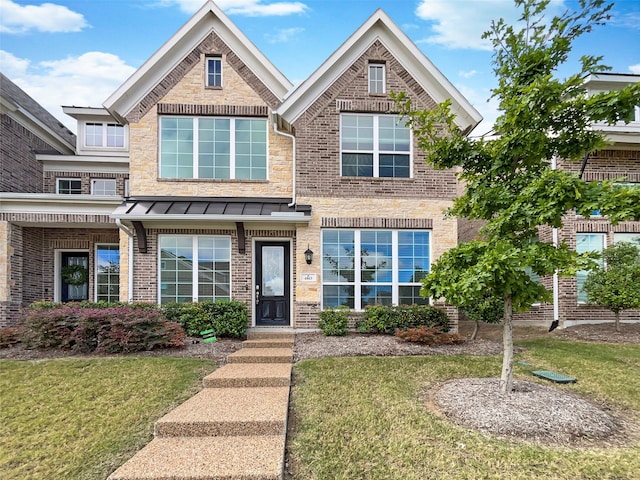 view of front of house with a front lawn