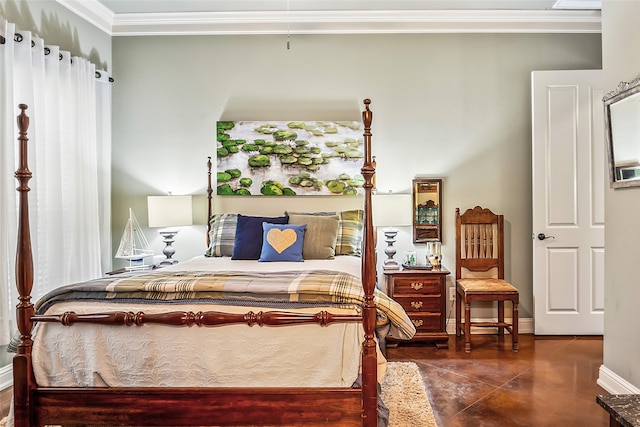 bedroom with dark tile patterned floors and crown molding