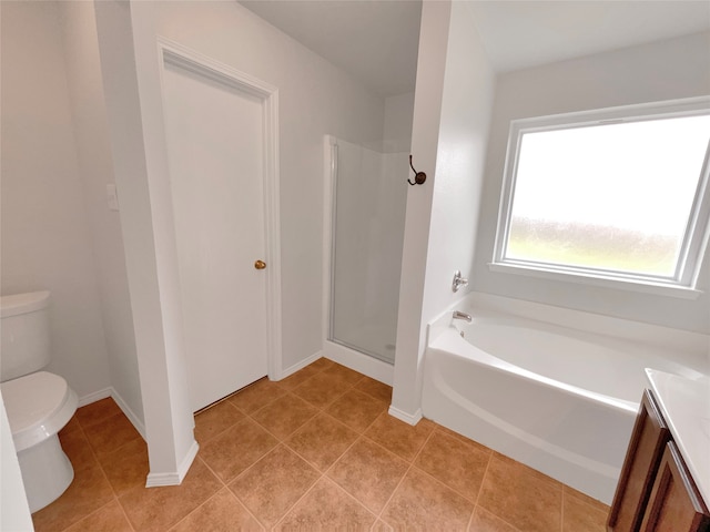 full bathroom featuring shower with separate bathtub, vanity, toilet, and tile floors