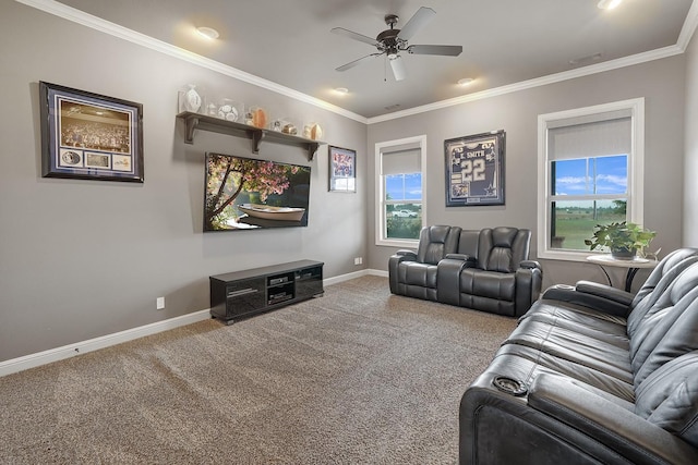 cinema room featuring crown molding, carpet flooring, and ceiling fan