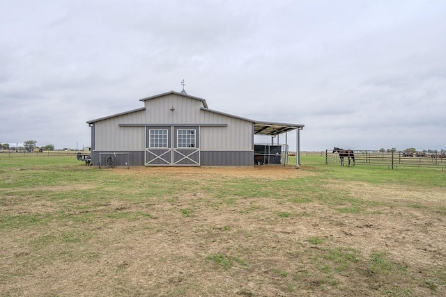 view of outdoor structure featuring a rural view