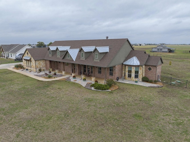 view of front of home with a front lawn